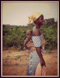 black woman with baby on back